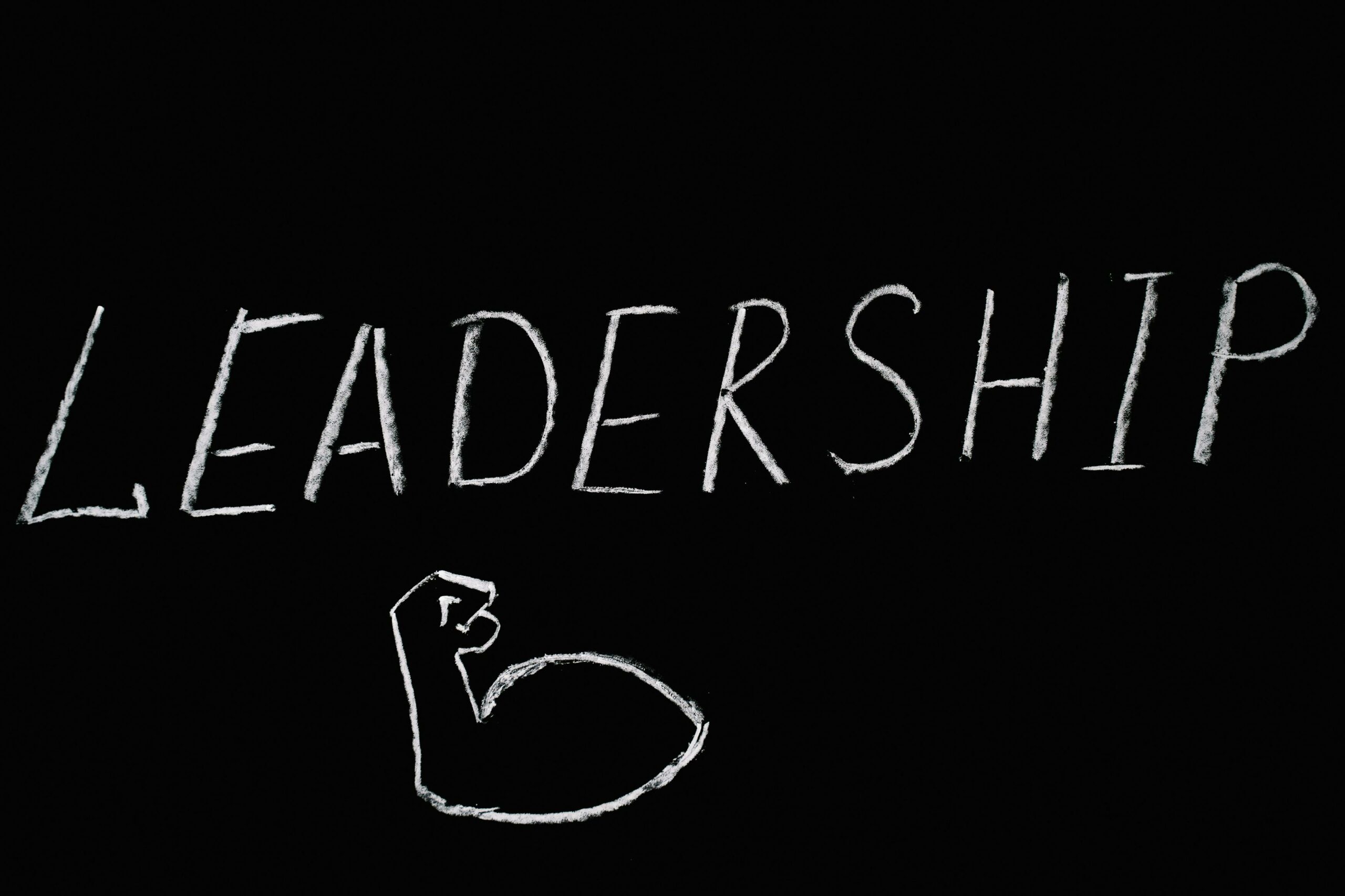 blackboard with the word leadership in white chalk